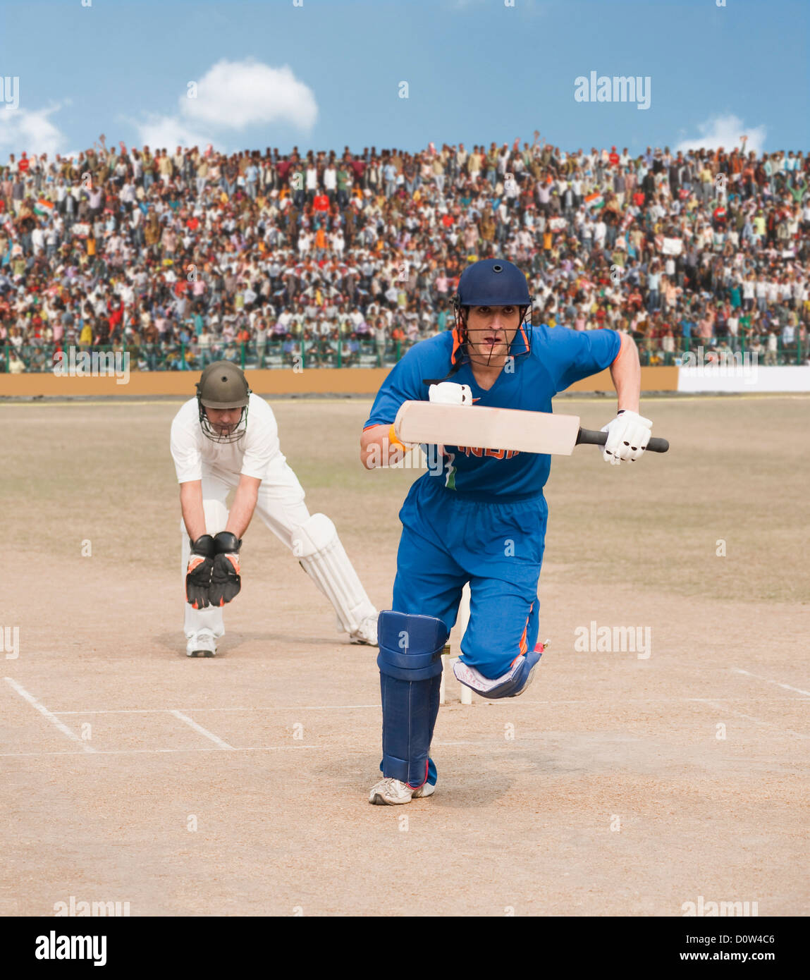 Cricket Batsman laufen Stockfoto