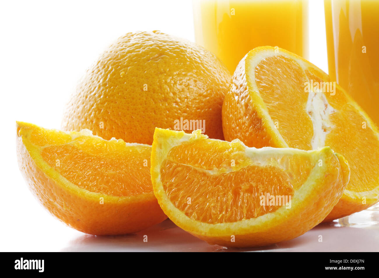 Orangen und Saft Stockfoto