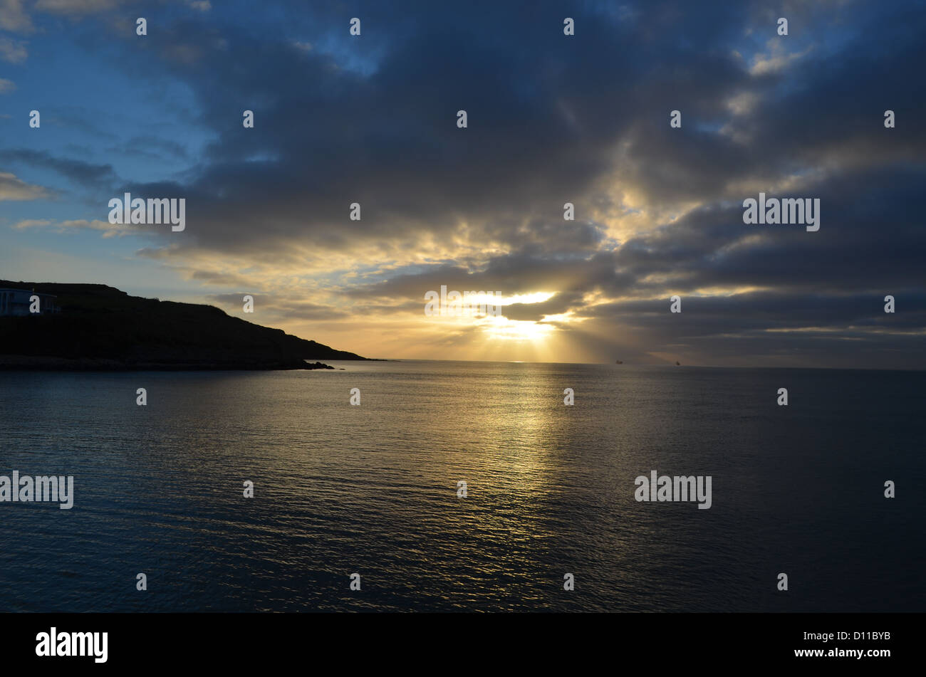 Sonnenaufgang am Bowleaze Cove Stockfoto