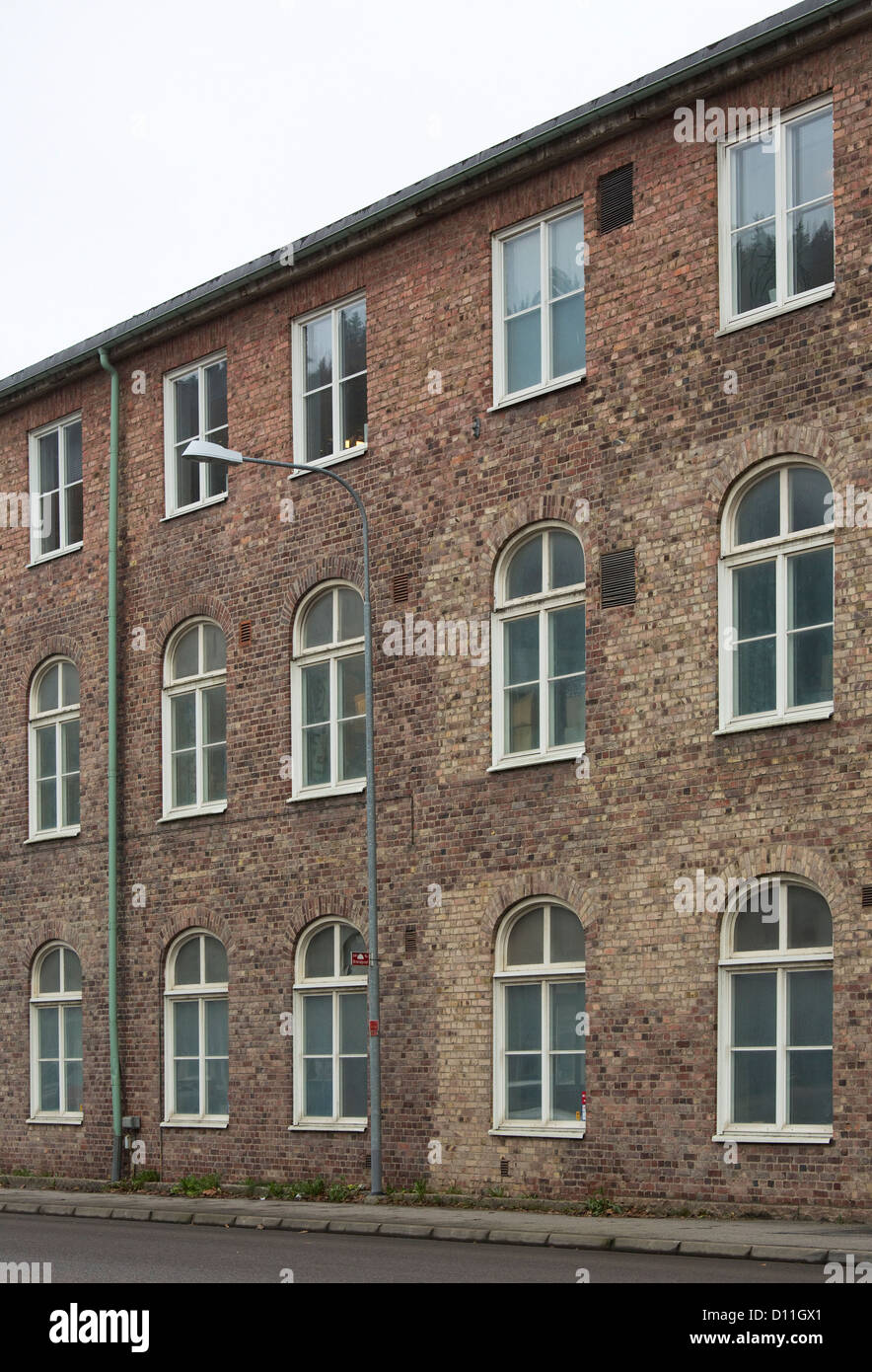 Altmodische Backsteinfassaden mit verglaste Fenster Stockfoto