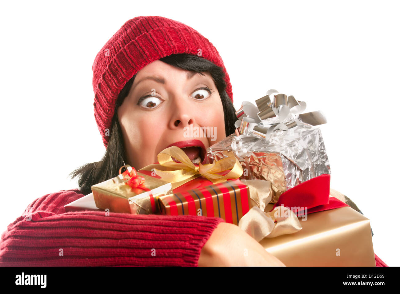 Attraktive Frau tastete mit ihrer Weihnachtsgeschenke, Isolated on White Background. Stockfoto