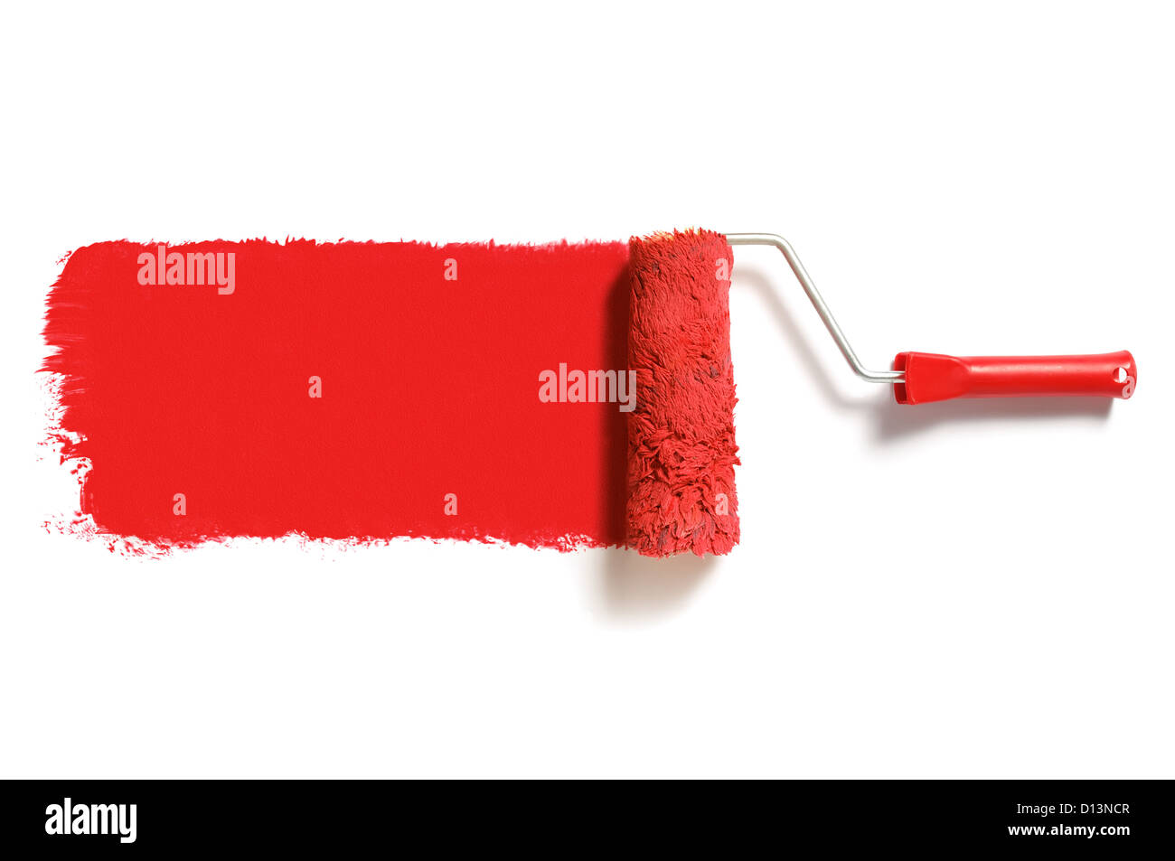 Bürstenrolle mit roter Farbe Stockfoto