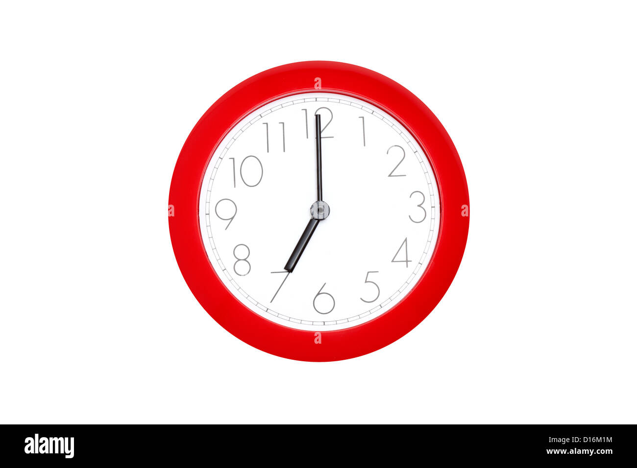 Rote Uhr zeigt sieben Uhr Stockfoto