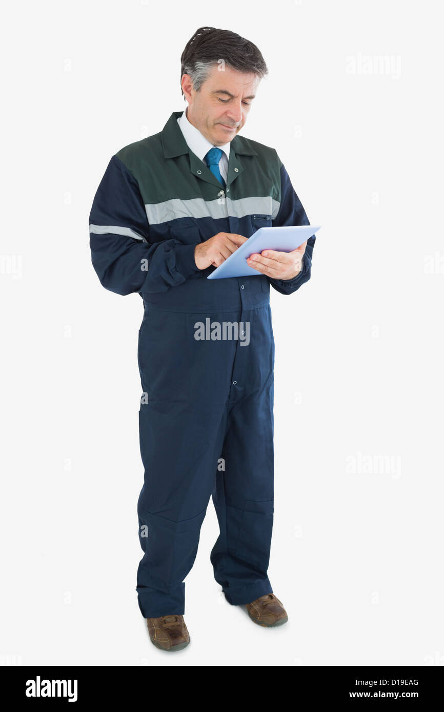 Reife Mechaniker mit digital-Tablette Stockfoto