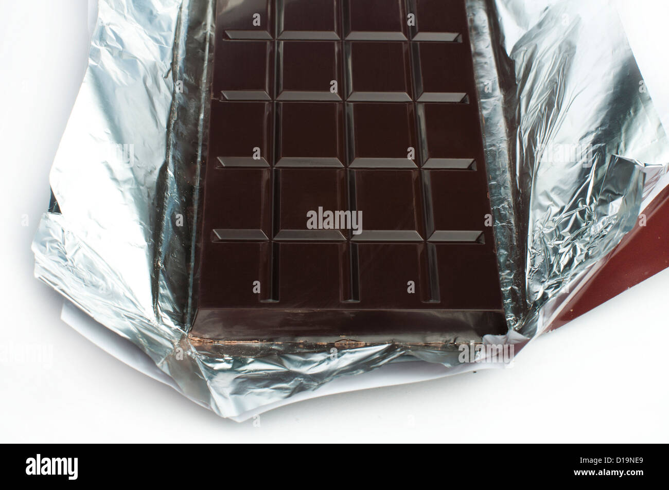 Tafel Schokolade in einer Verpackung aus Aluminium-Folie Stockfoto