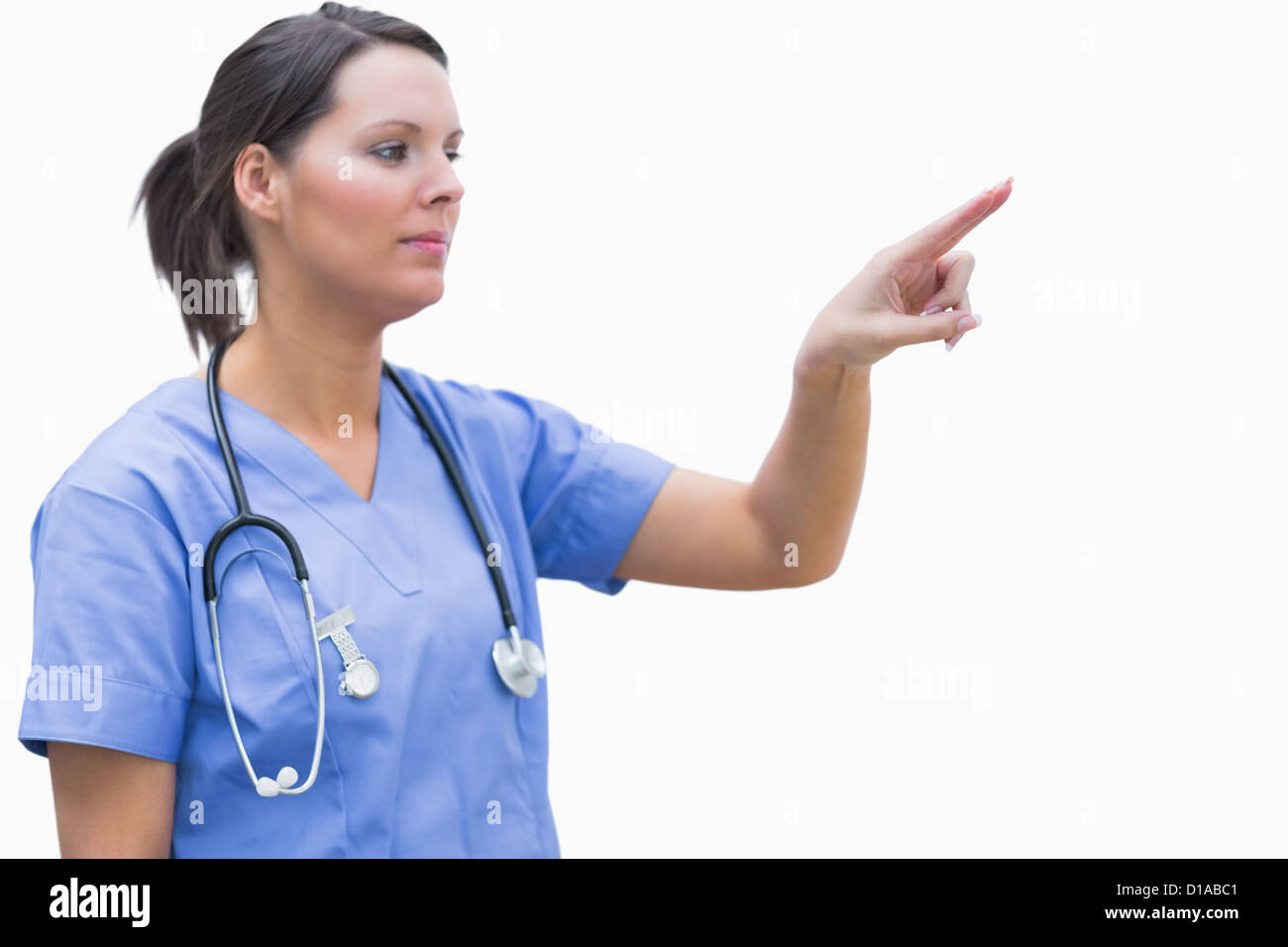 Weibliche Chirurg auf unsichtbare Bildschirm zeigen Stockfoto