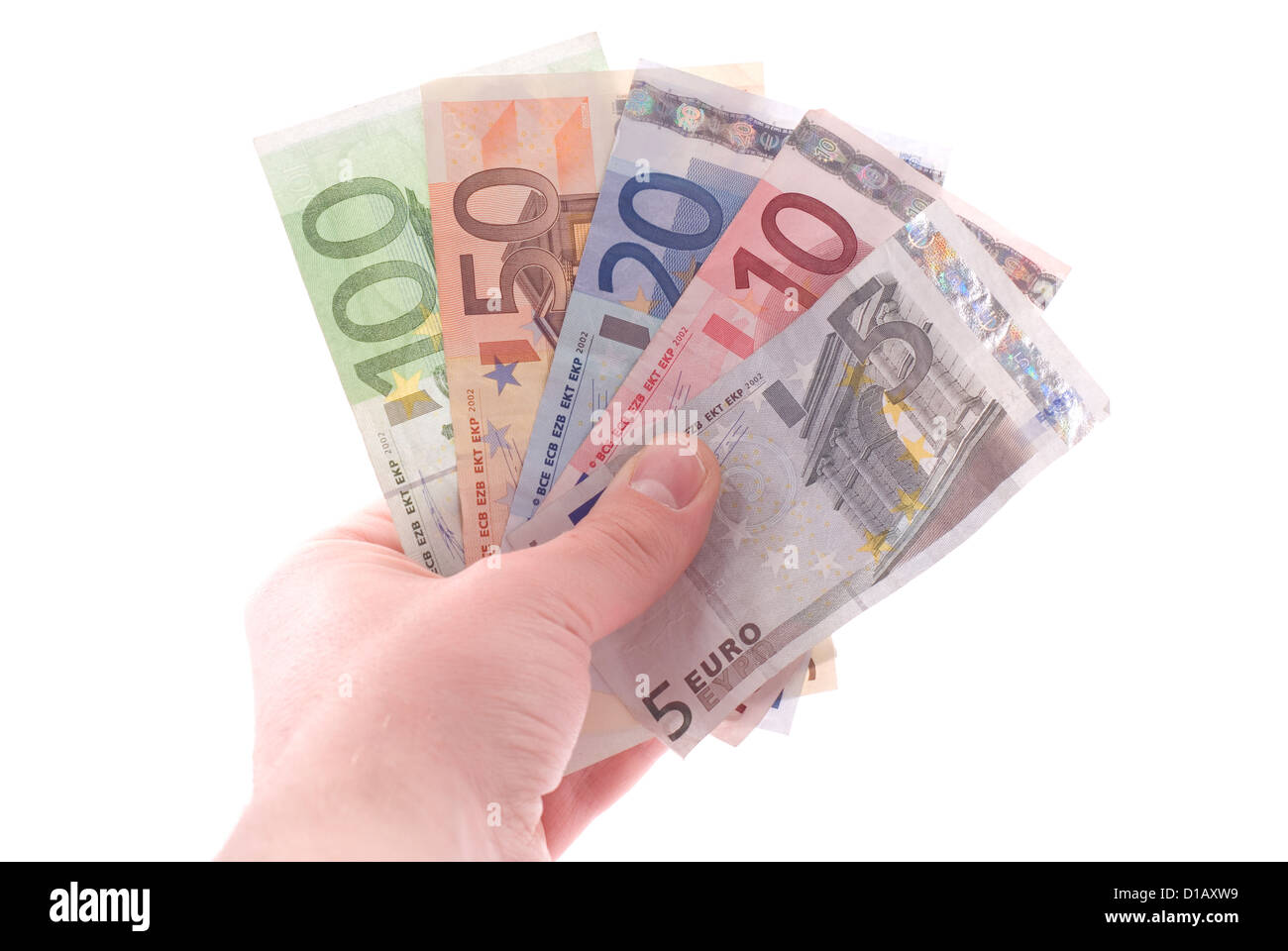 Euro-Banknoten in einer Hand. Isoliert auf weiss. Stockfoto