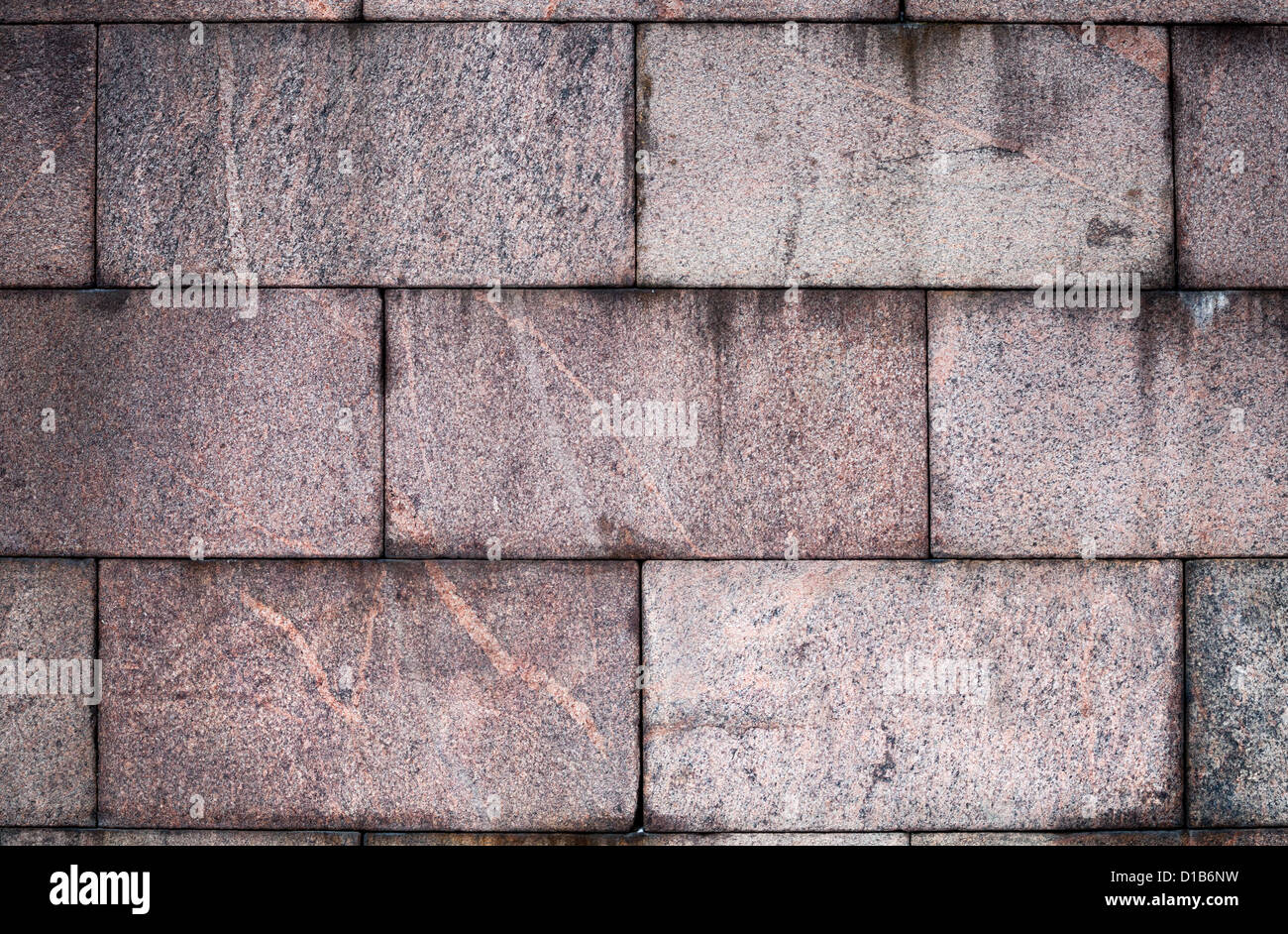 Alte Steinwand rote Granit detaillierte Textur Stockfoto