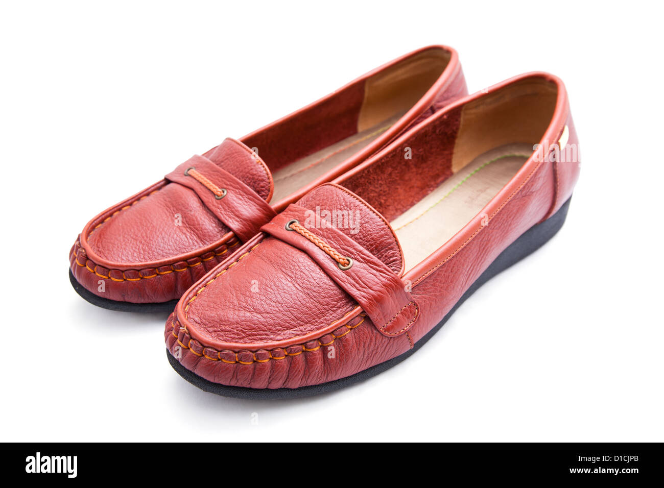 weibliche rote Schuhe Stockfoto