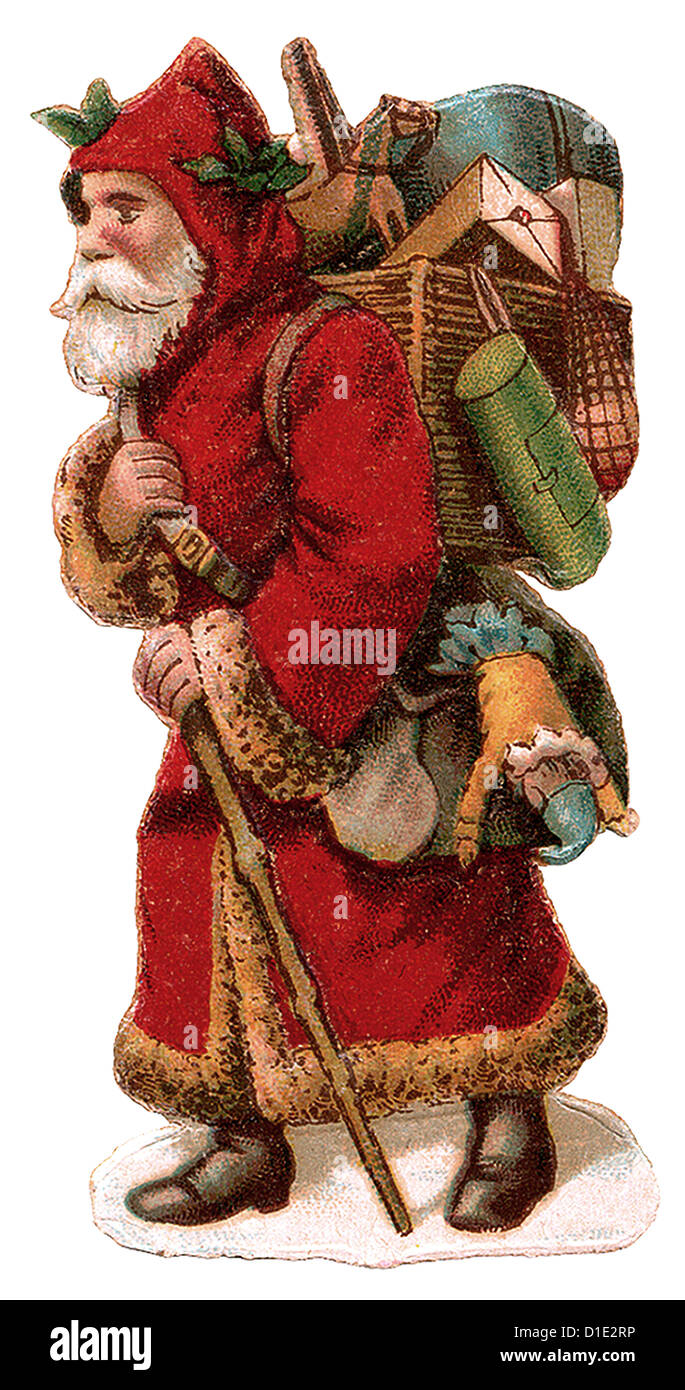 Santa Claus steht auf Seite Korb voller Geschenke und Spielzeug Stockfoto