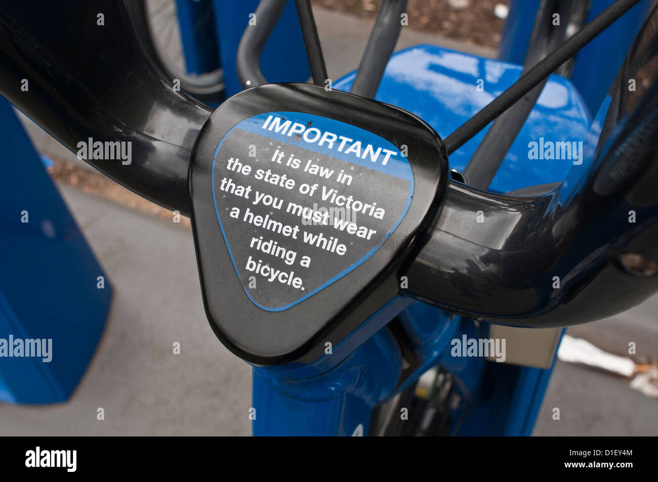 Die Melbourne Fahrradverleih Helmwarnung Stockfoto