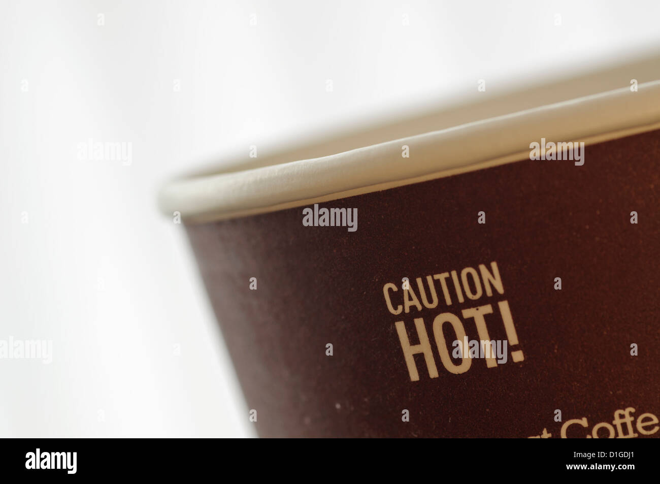 Vorsicht heiß Zeichen auf Kaffeetasse Stockfoto