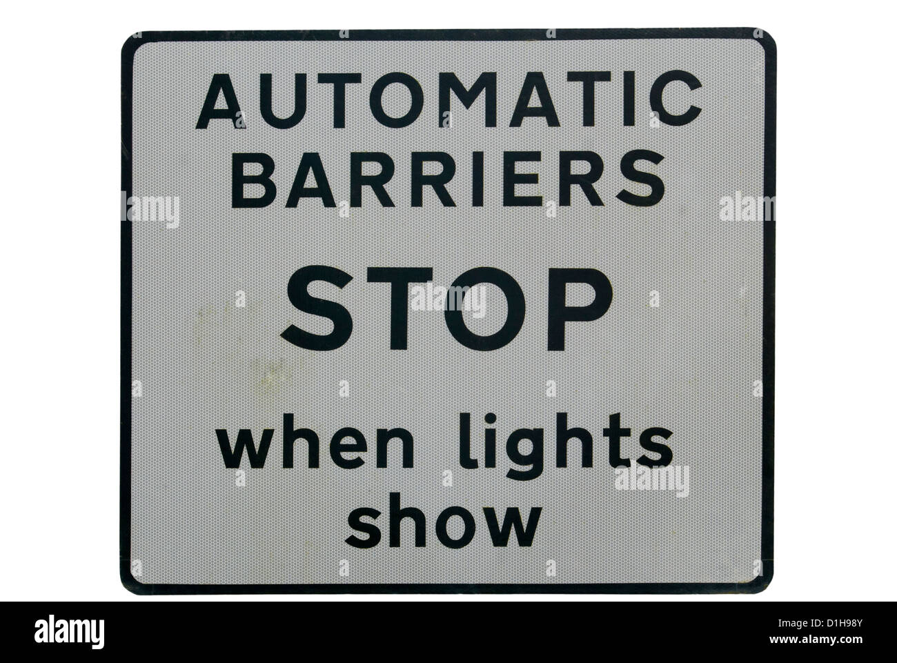 Automatische Schranken-Stop wenn Lichter Straßenschild zeigen Stockfoto