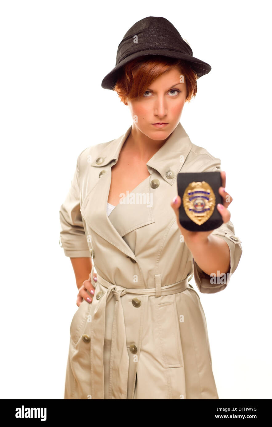 Detektivin mit offiziellen Abzeichen In Trenchcoat isoliert auf einem weißen Hintergrund. Stockfoto
