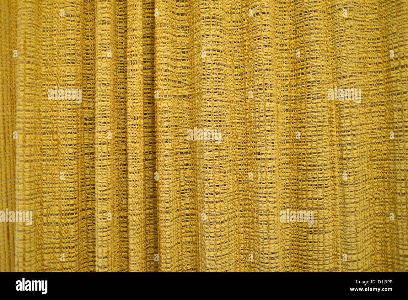 Gelber Vorhang oder drapieren Textur, hoher Auflösung und sehr detailliert. Stockfoto