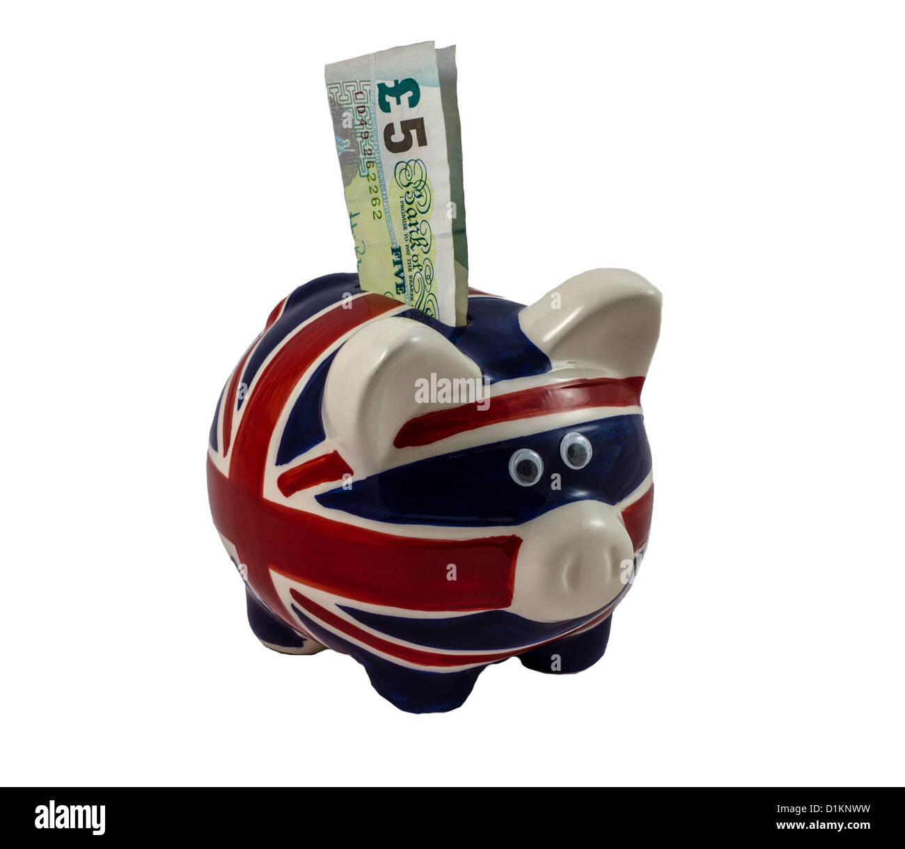 British-Sparschwein mit Noten Stockfoto