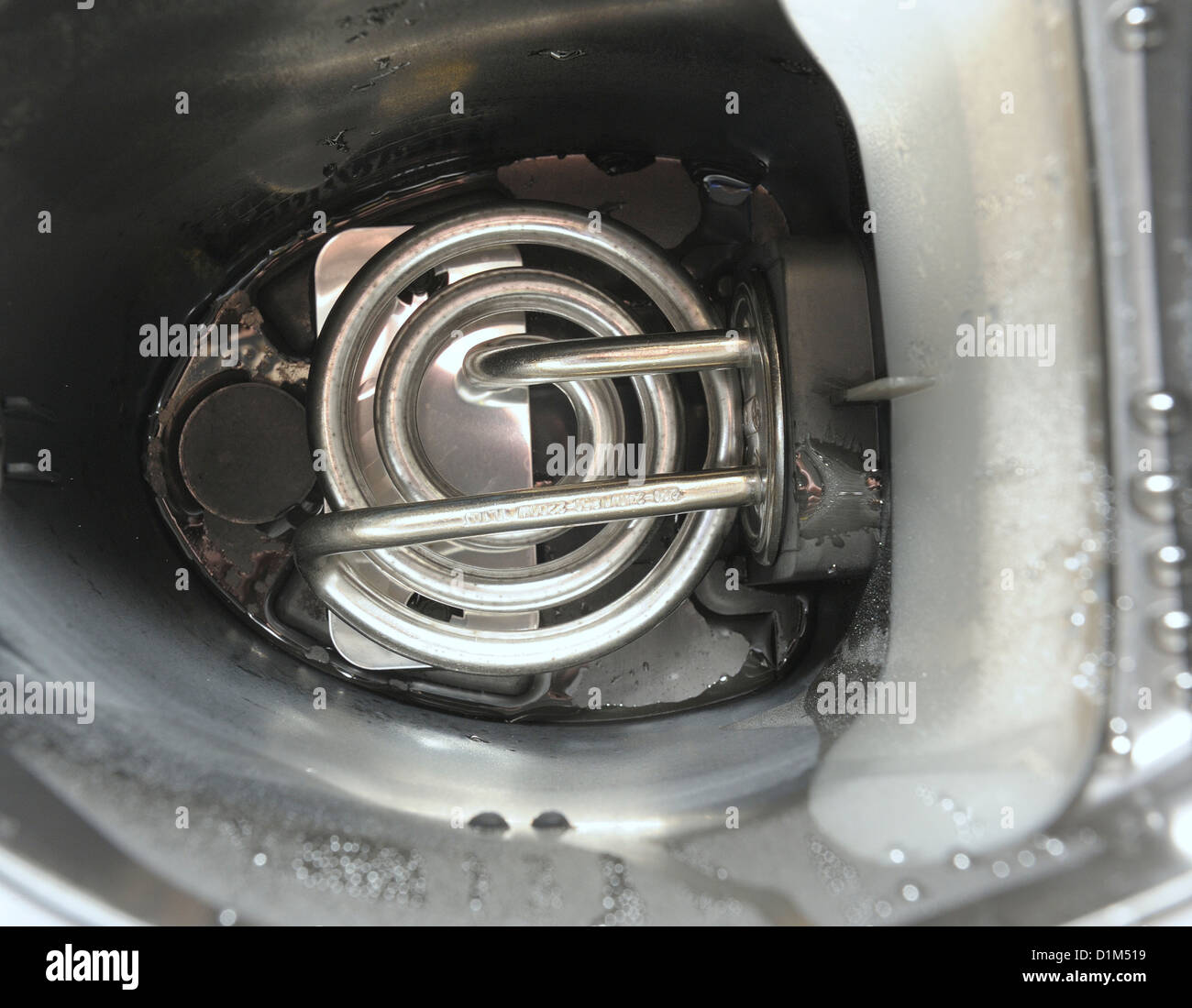 Heizelement in der Unterseite des inländischen Wasserkocher Stockfoto