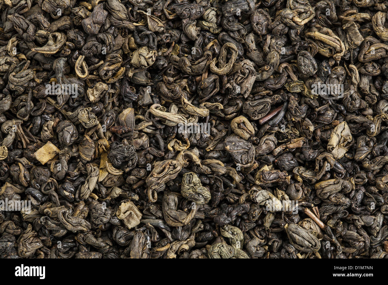 Hintergrundtextur von Loseblatt Chinesse Schießpulver (Perle) grüner Tee Stockfoto