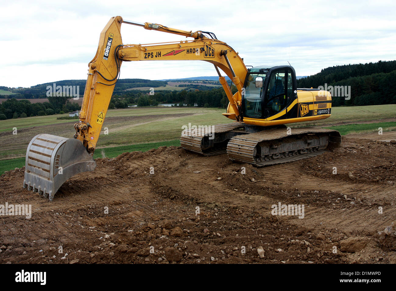 Baumaschinen auf neue Autobahn Stockfoto