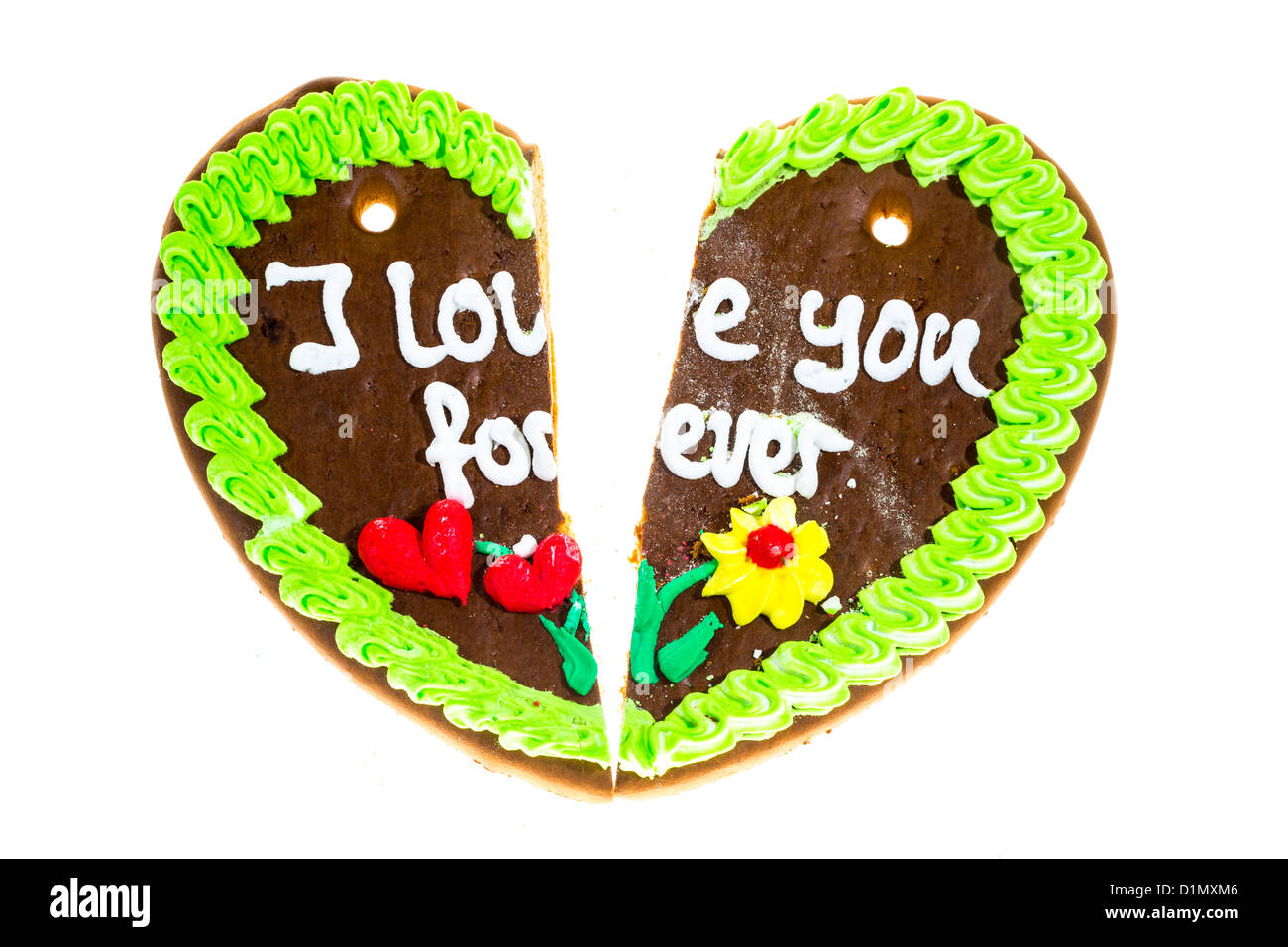 Lebkuchenherz, in zwei Stücke gebrochen Symbol für fertige Liebe, Beziehung. Stockfoto