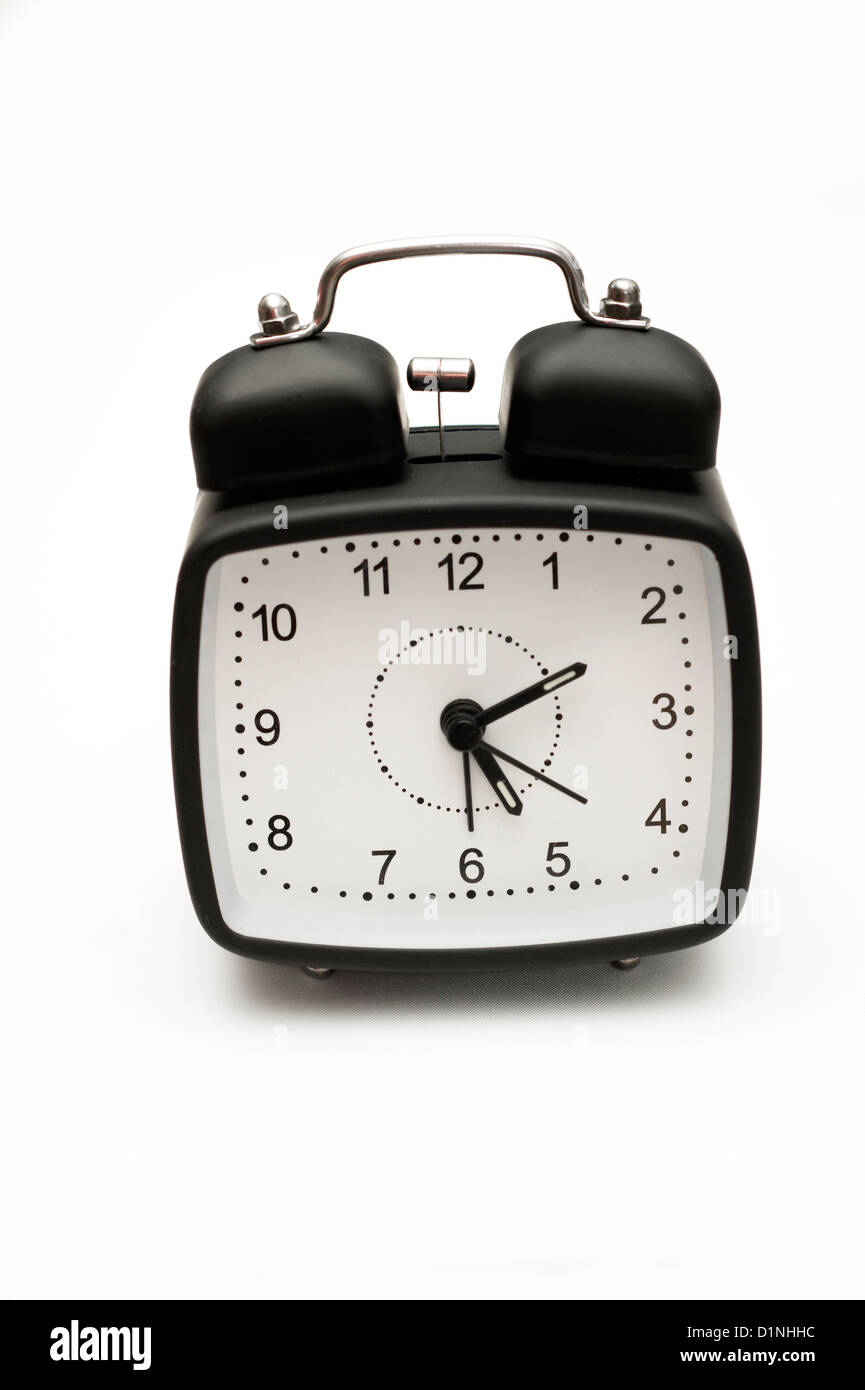Ein Wecker auf weißem Hintergrund Stockfoto