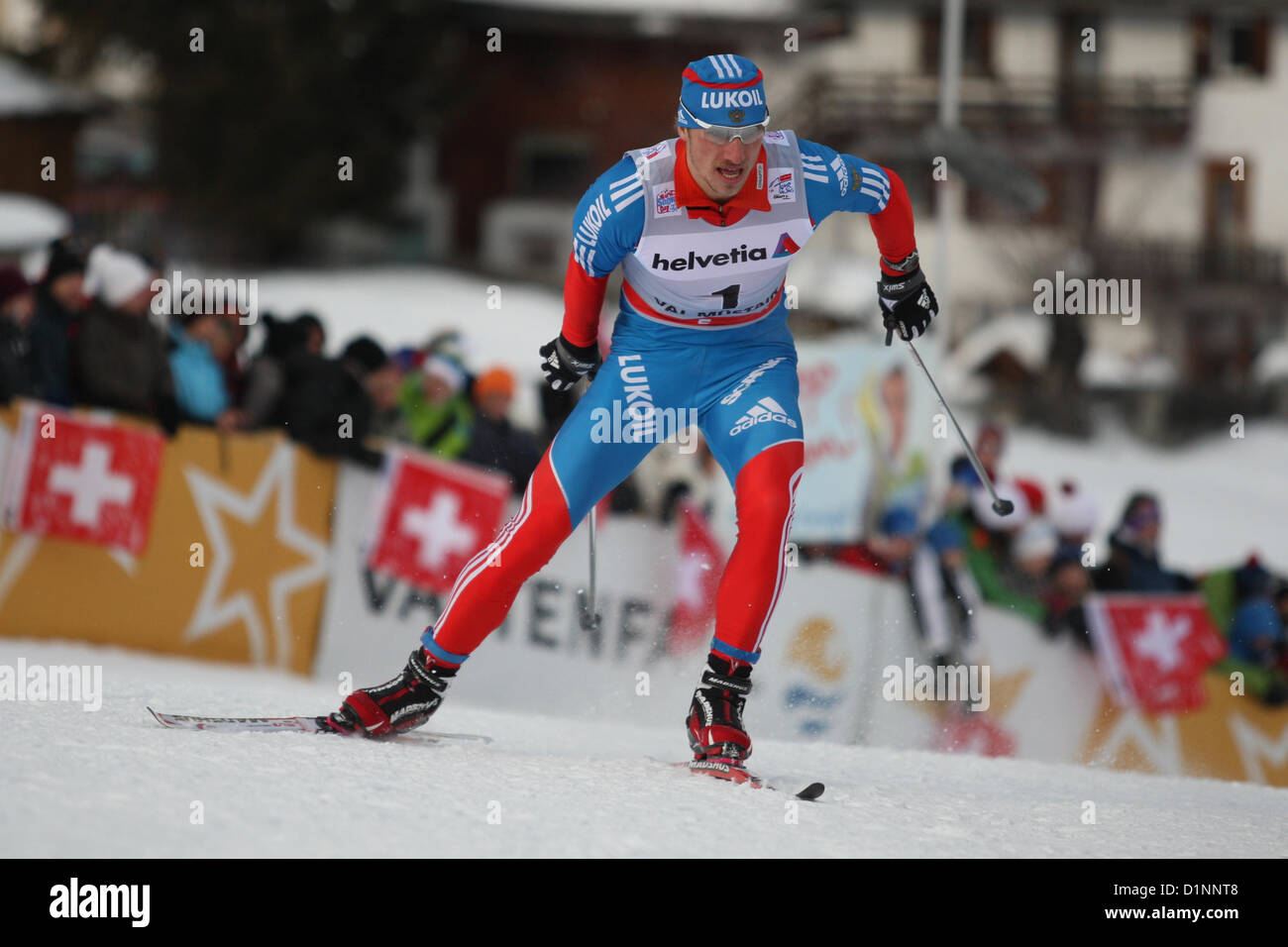 01.01.2013 Val Müstair, Schweiz. Sergey Turyshev (RUS) in Aktion bei den Sprints Finals der Cross Country Ski World Cup - Tour de Ski - Val Müstair - Schweiz - 1,4 km frei Sprint Damen Stockfoto