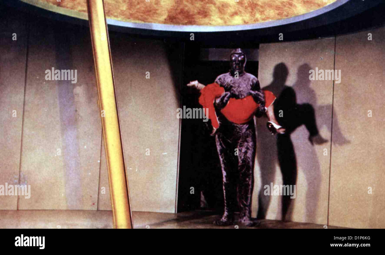 Invasion Vom Mars Invasoren vom Mars Helen Carter Ein Marsmensch hat Dr. Blake (Helen Carter) in Seiner Gewalt. Lokale Stockfoto