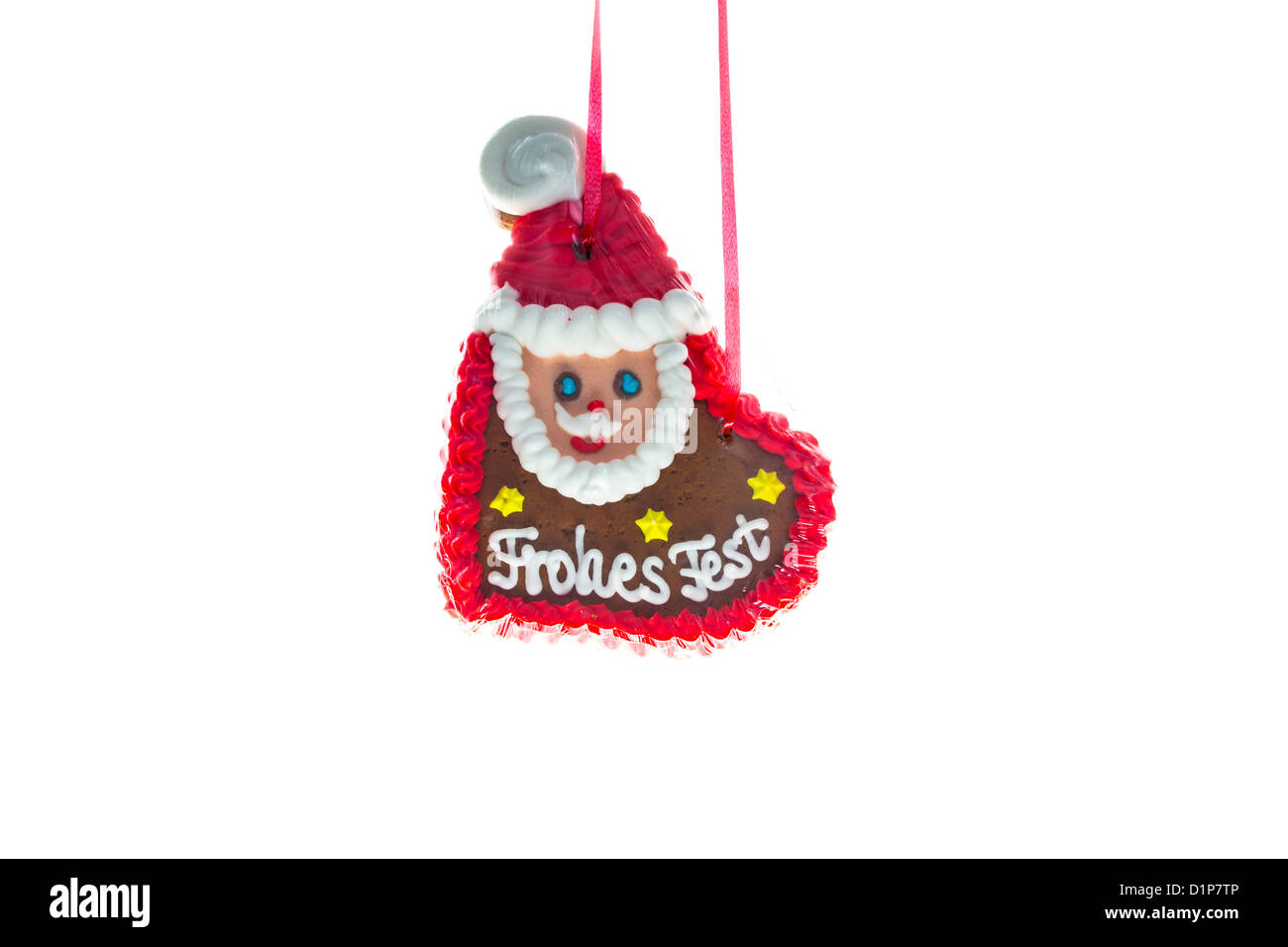 Lebkuchen, Herz, Santa Claus, wünscht frohe Weihnachten in deutscher Sprache. Stockfoto