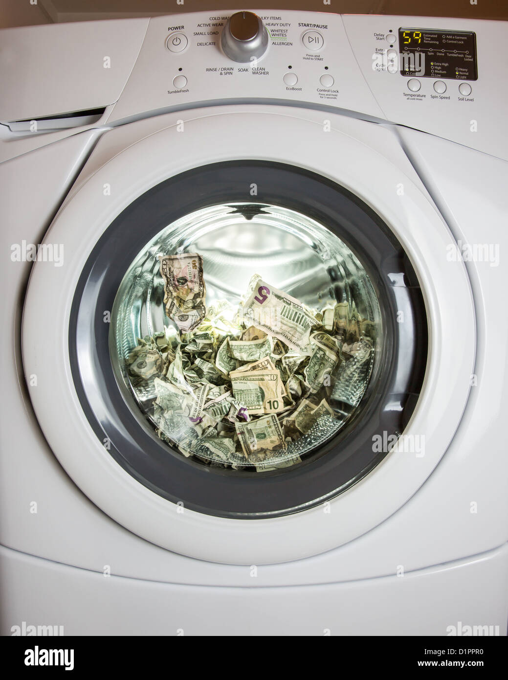 Es geht nicht nur um sauberes Geld. Die kriminelle Weg von Geldwäsche Geld ist ein bisschen anders, aber dieses Bild den Punkt ankommt. Stockfoto