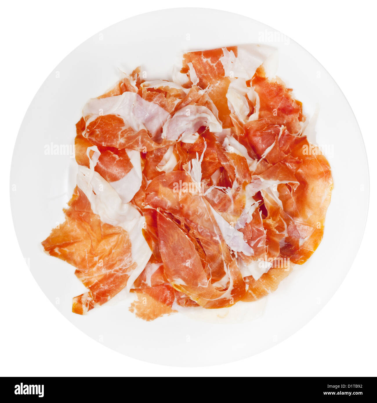 Draufsicht der geschnittenen Schinken Prosciutto di Parma auf Platte isoliert auf weißem Hintergrund Stockfoto