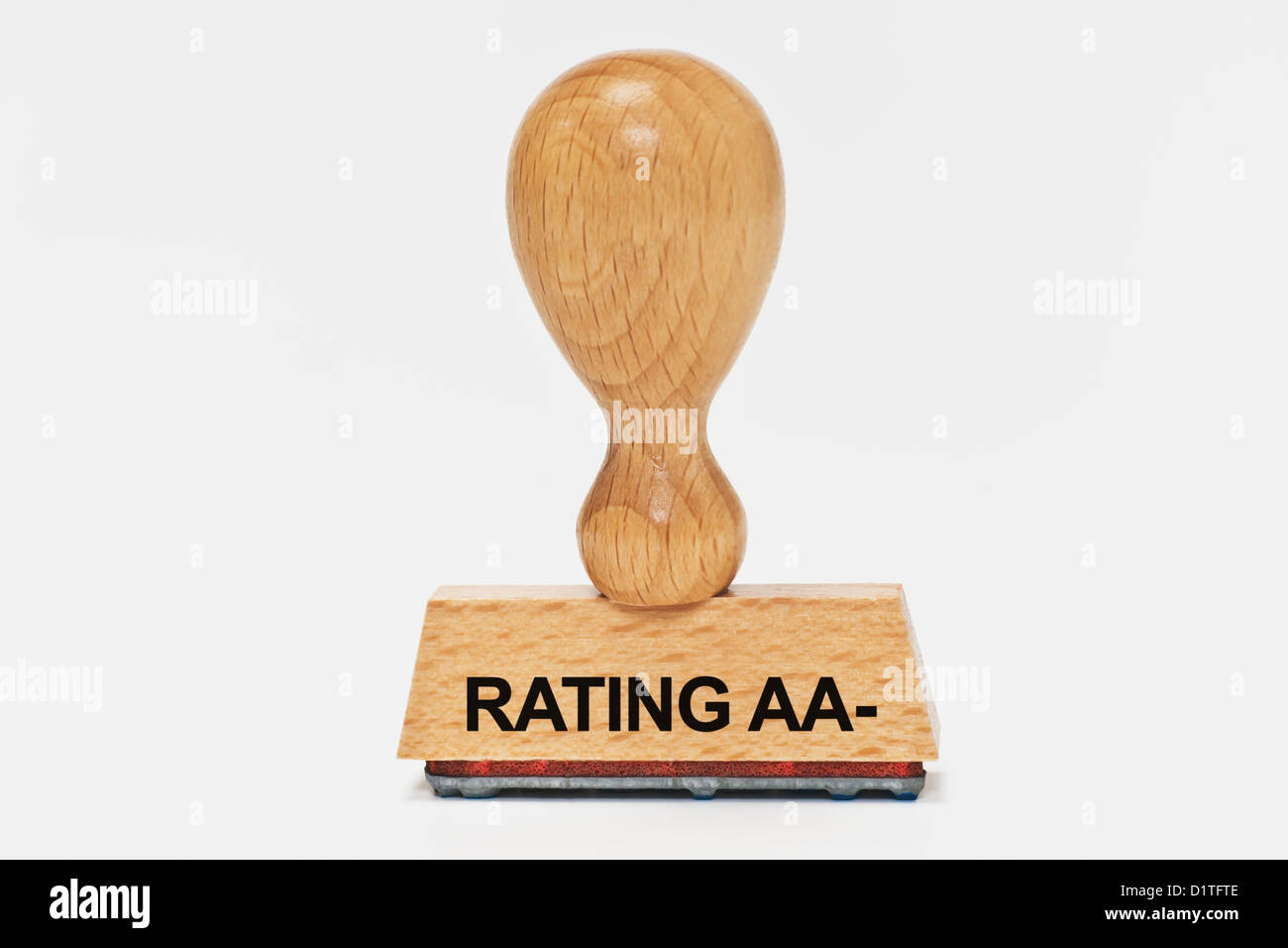 Detail-Foto von einem Stempel mit der Aufschrift Rating AA minus, Hintergrund weiß Stockfoto