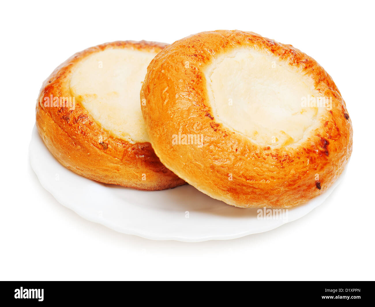 frische Brötchen Muffins mit Quark zum Frühstück isoliert auf weißem Hintergrund Stockfoto