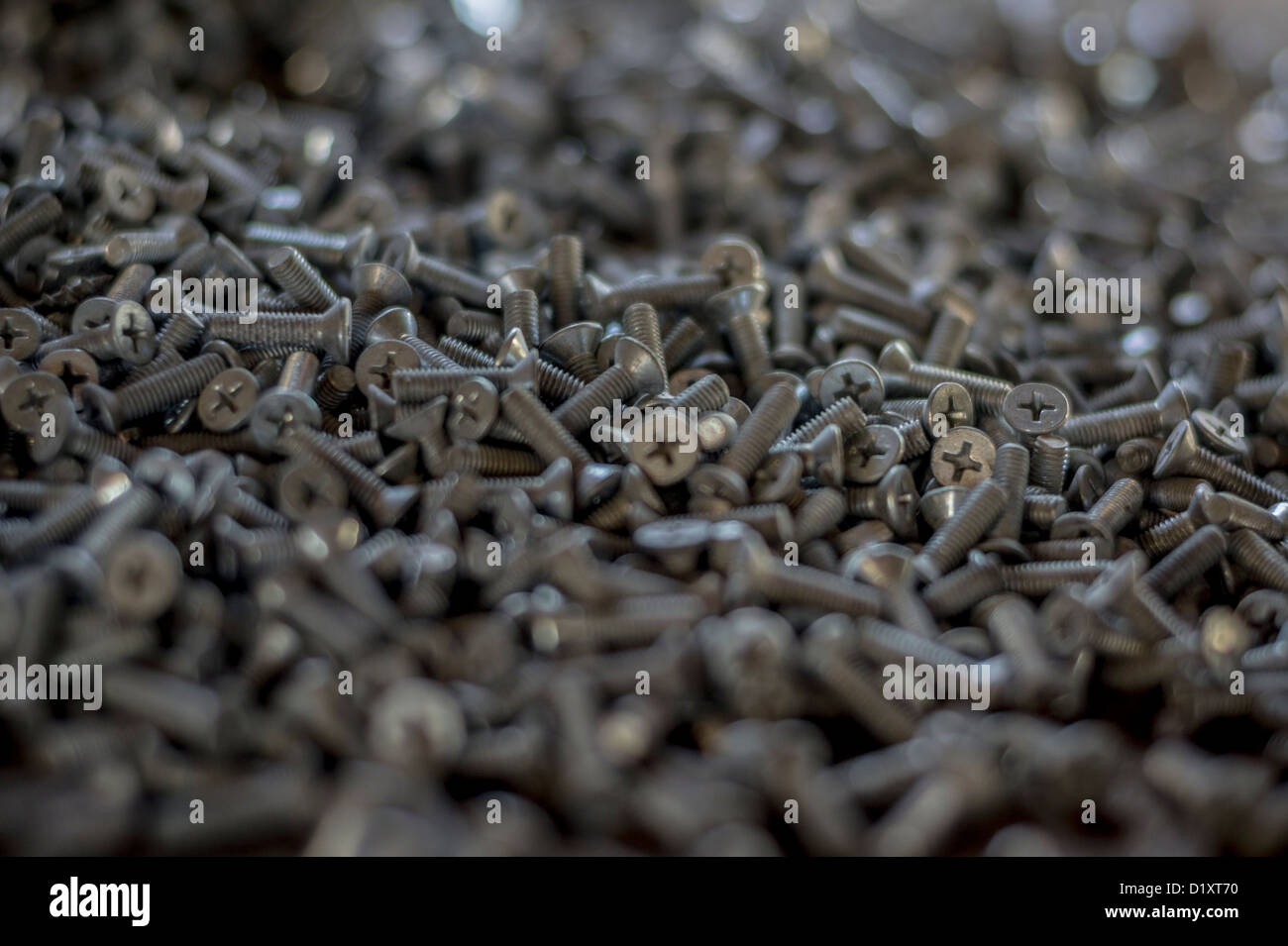 Zahlreiche Maschinenschrauben Stockfoto