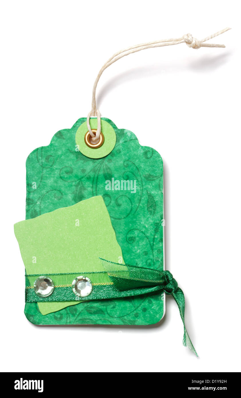 Grüne Preisschild mit Schleife und Dekoration auf weißem Hintergrund - handgefertigt Stockfoto