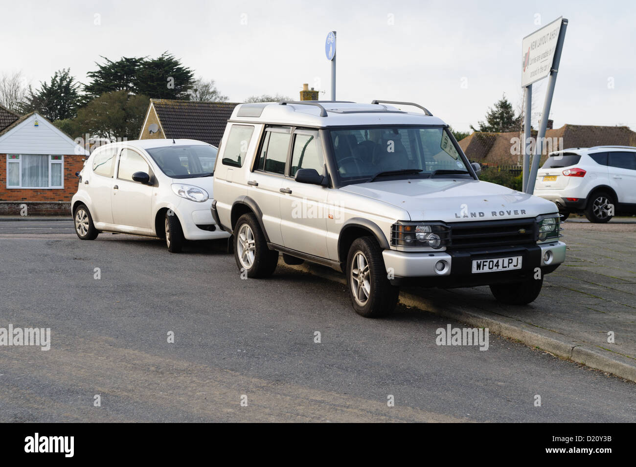 Parken auf dem Bürgersteig Stockfoto