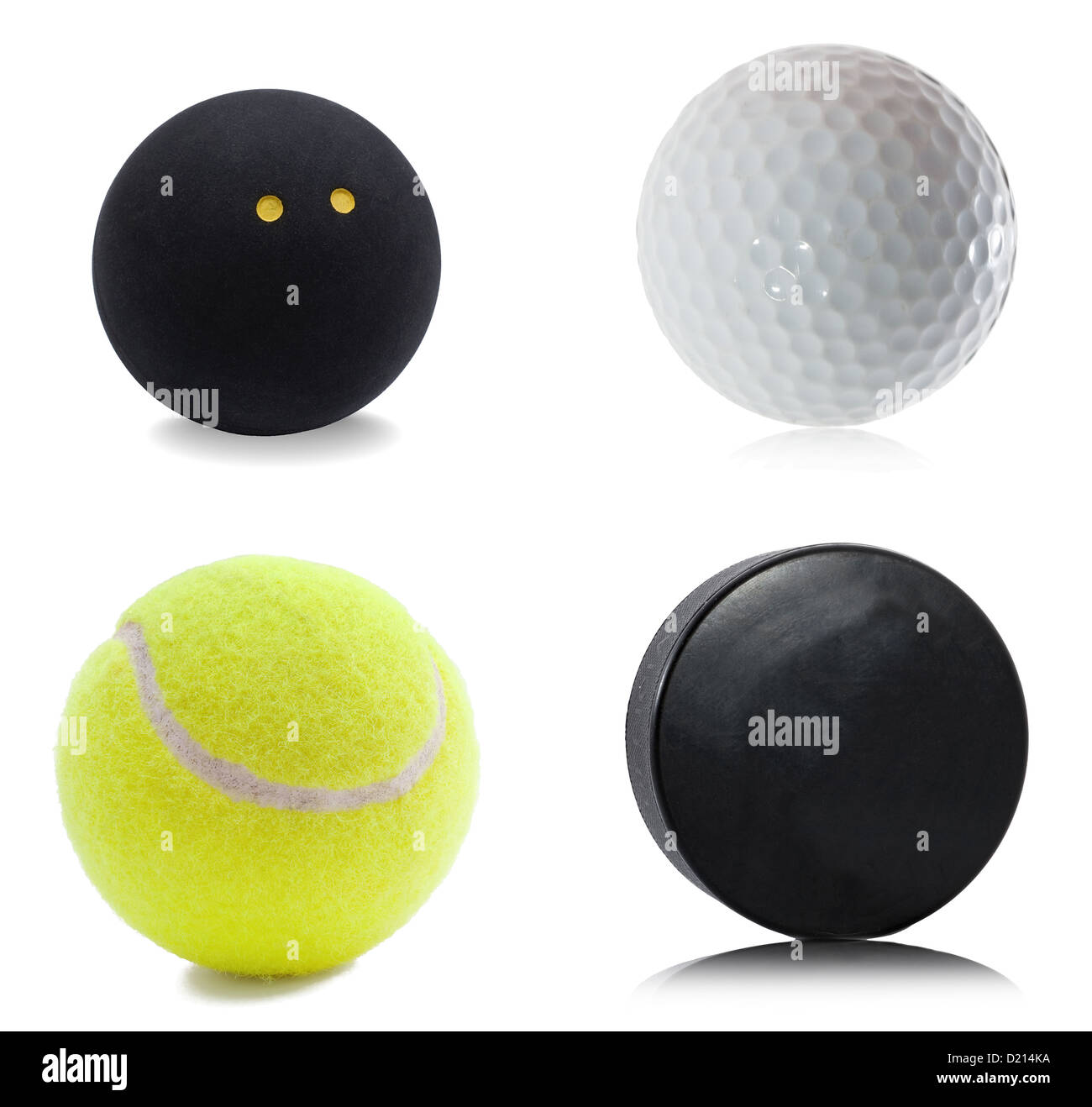 Hockey-Puck, Squash, Tennis und Golf-Ball isoliert auf weißem Hintergrund Stockfoto