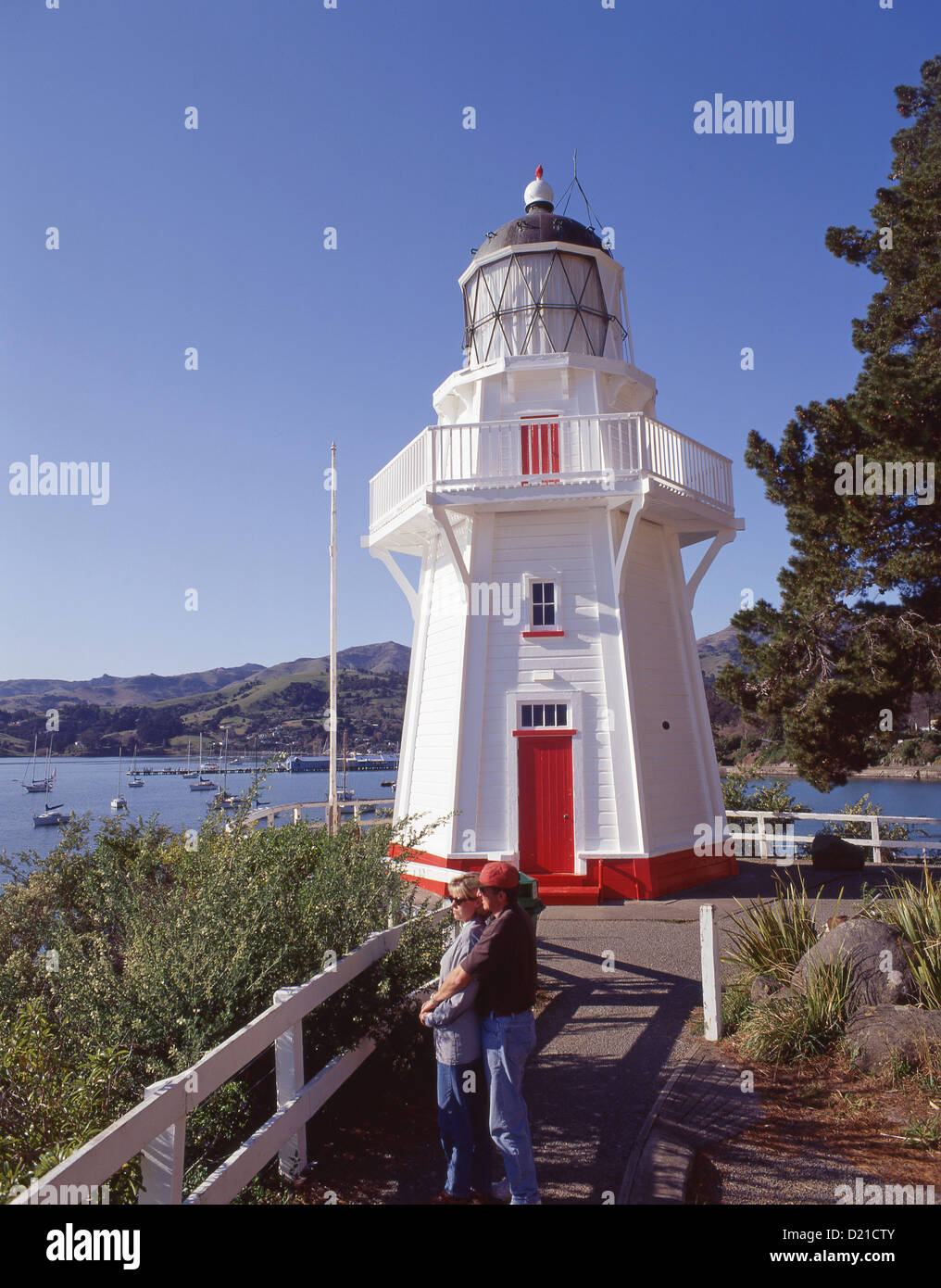 Akaroa Köpfe Leuchtturm, Friedhof Point Beach Road, Akaroa, Banks Peninsula, Canterbury, Neuseeland Stockfoto