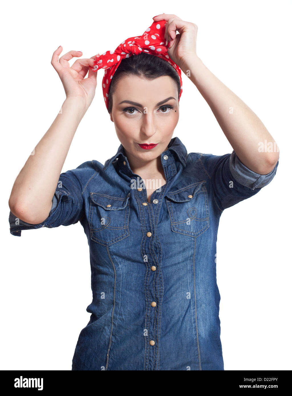 Frau in Jeanshemd mit rotem Halstuch Stockfoto