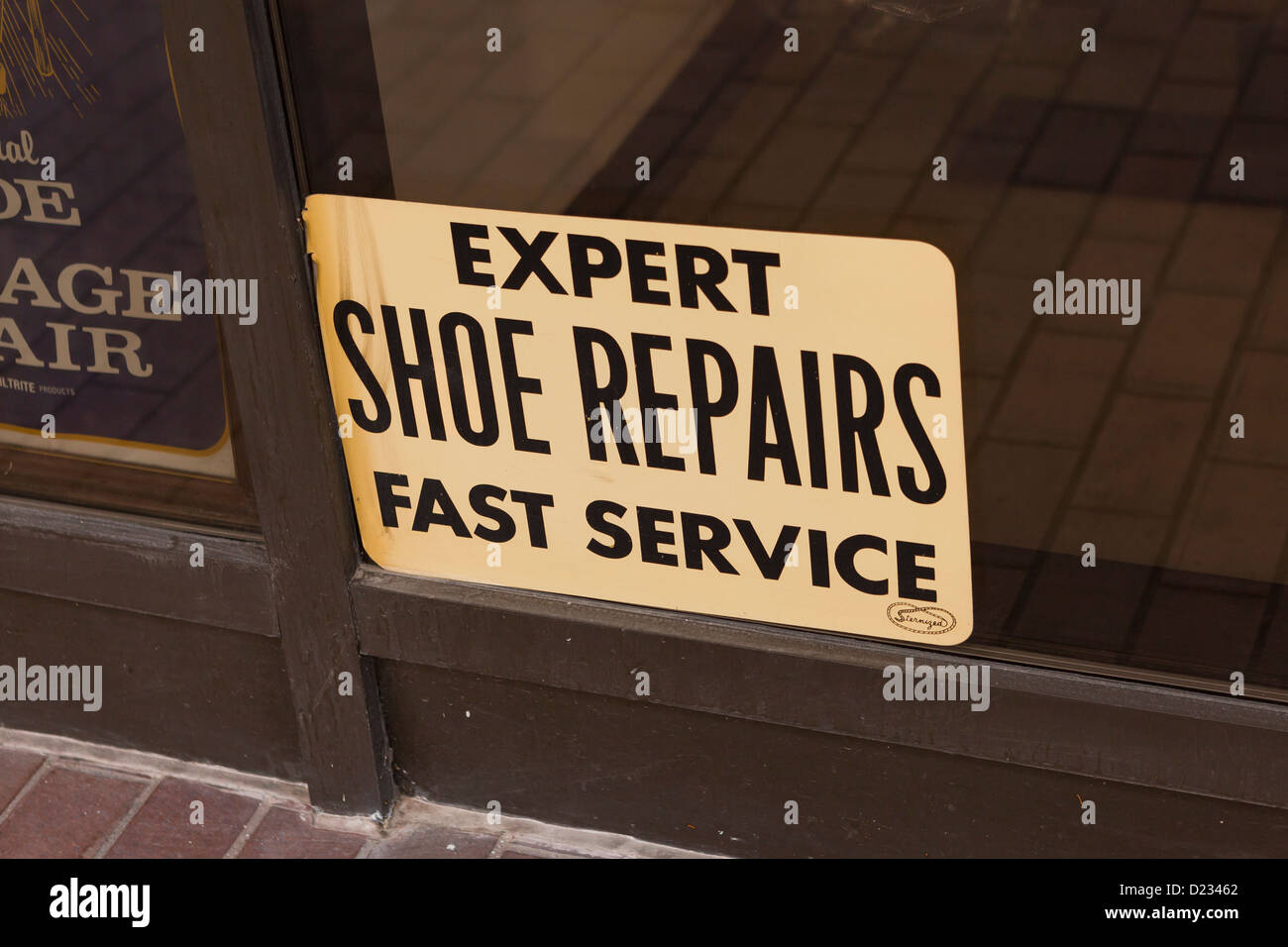 Schuh-Reparatur-Service-Zeichen Stockfoto