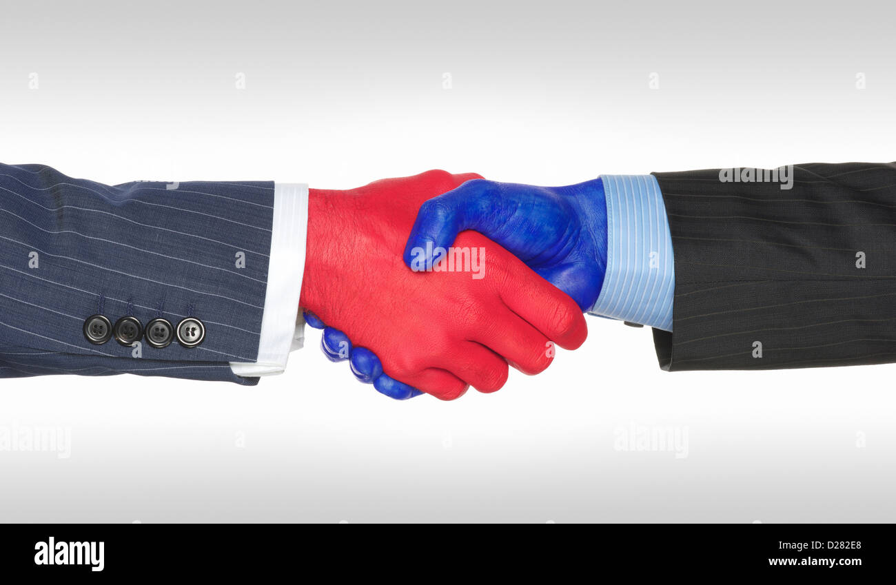 Handshake zwischen zwei Männer. Handshake bezeichnet die kreative Konzept der republikanischen und demokratischen politischen Parteien zustimmen. Stockfoto