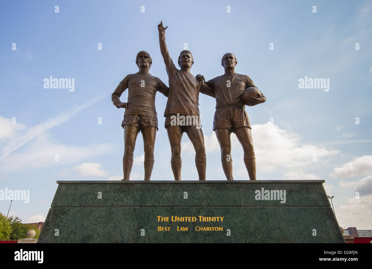 Die Vereinten Trinität. Statue außerhalb Fußballstadion Old Trafford von Dennis Law, George Best und Bobby Charlton. Stockfoto