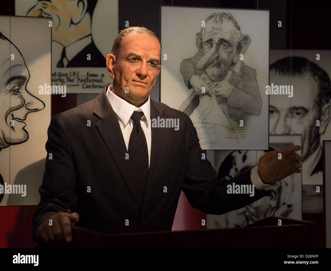 Animatronic Lyndon B Johnson umgeben von Präsidenten Karikaturen im LBJ Museum und Presidential Library in Austin, Texas Stockfoto