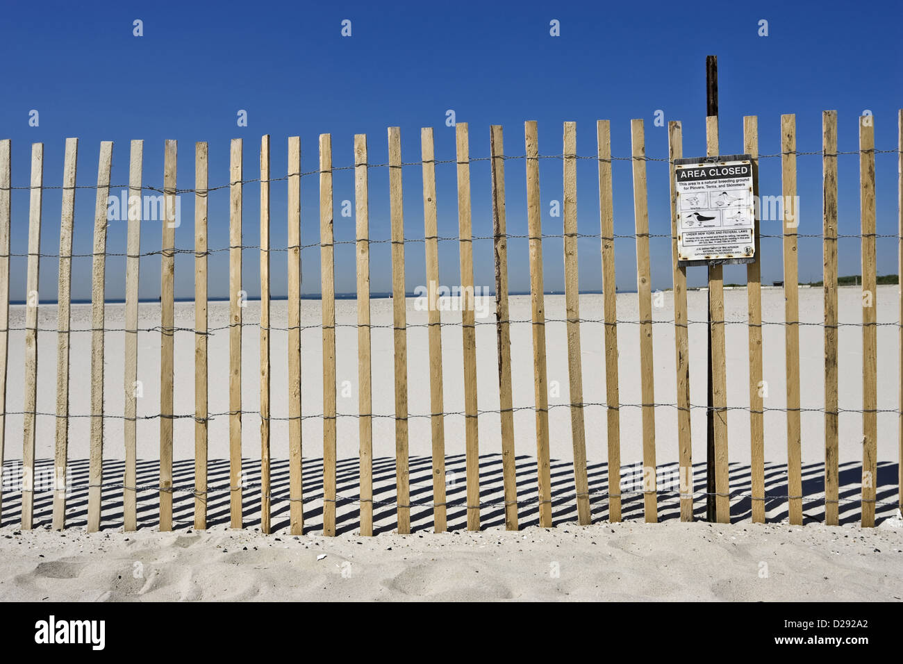 Zaun an einem Strand Stockfoto