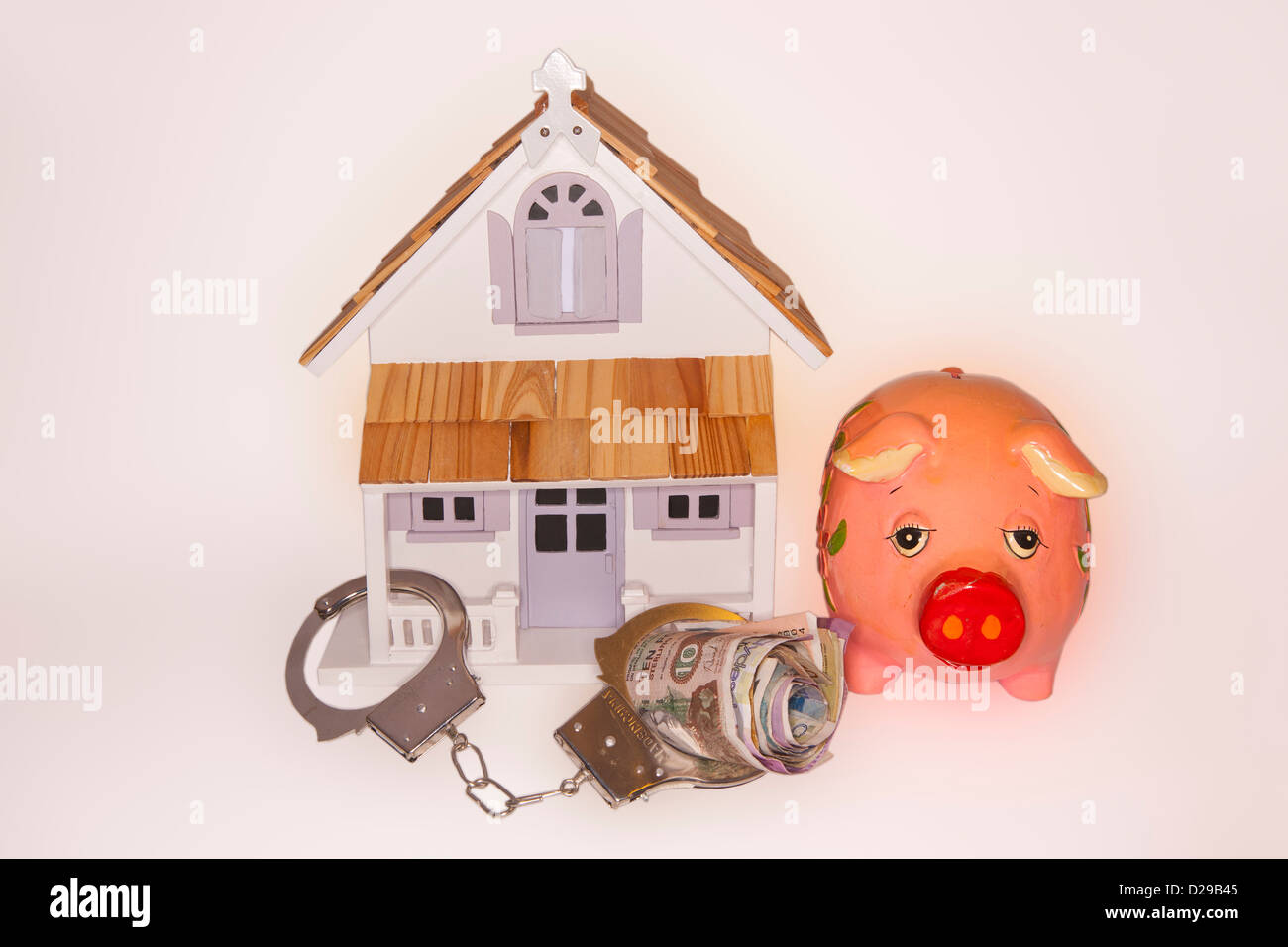 Konzept, Immobilienmarkt, Einsparungen, Haus der Angst Stockfoto
