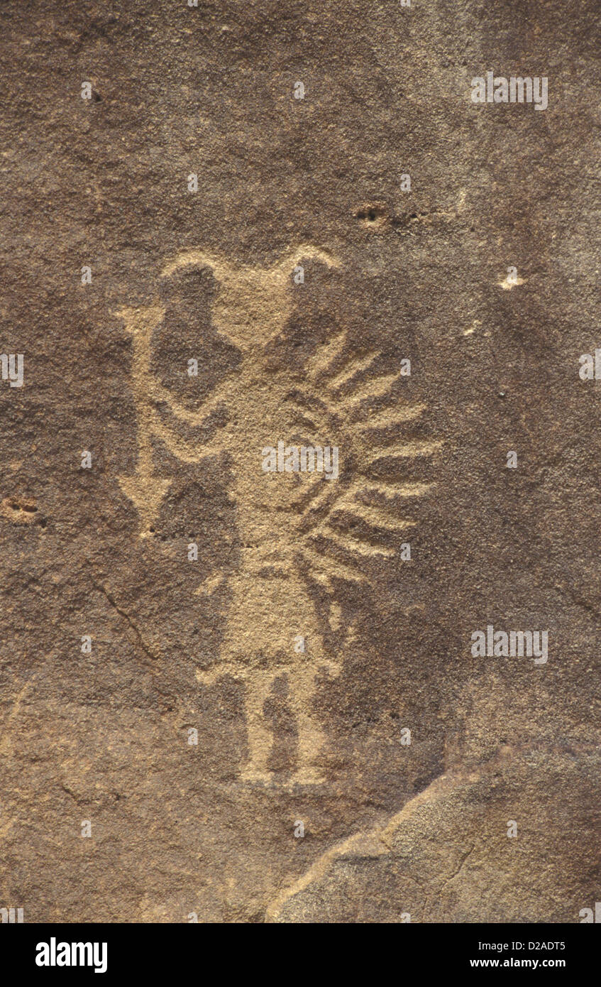 New-Mexico. Largo Canyon. Petroglyphen. Mann mit Schild und Pfeil. Stockfoto