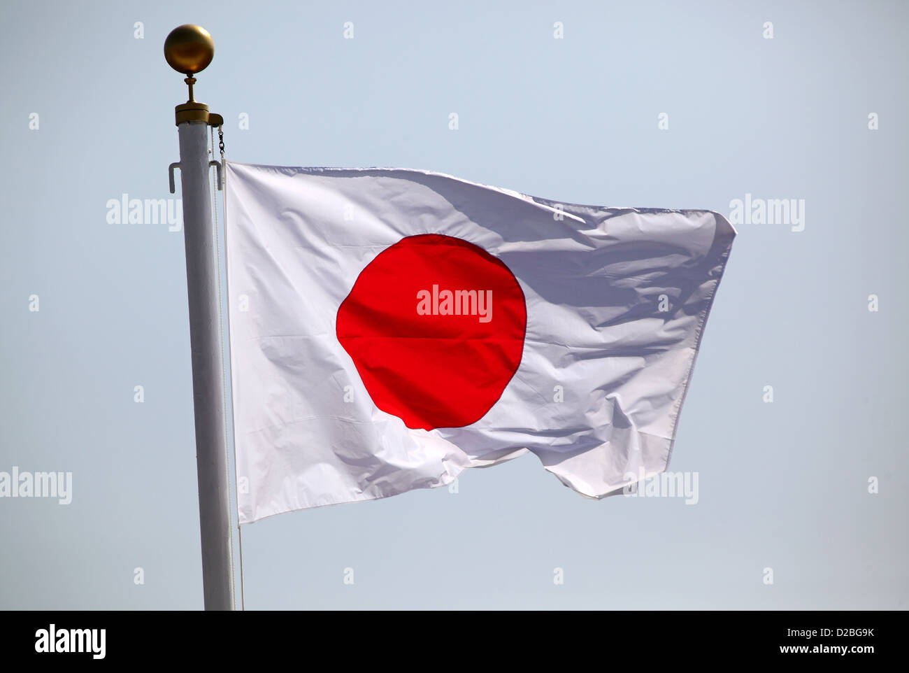 Hong Kong, China, Japan, im Wind wehende Flagge Stockfoto