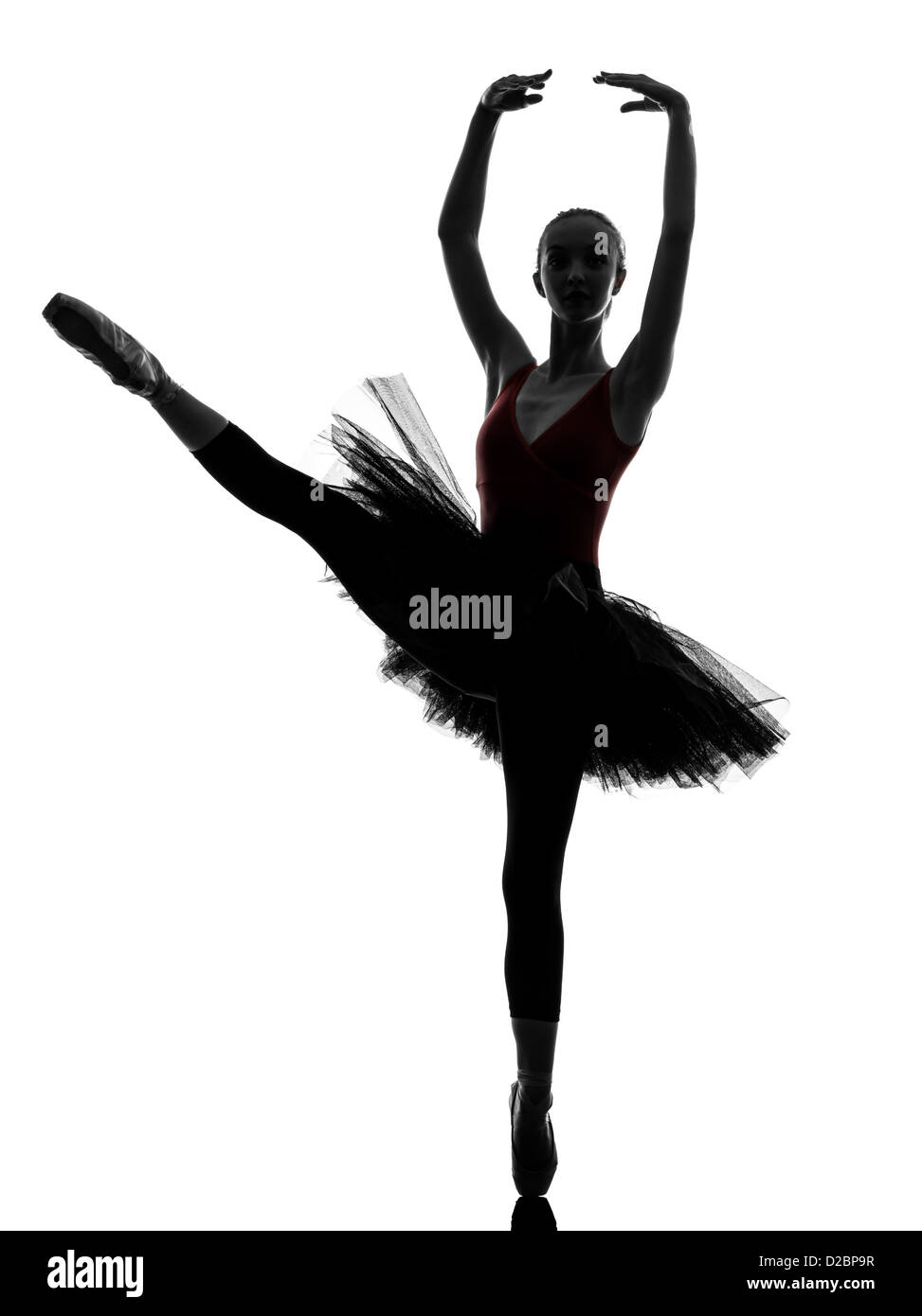 eine junge Frau Ballerina Ballett-Tänzerin, Tanz mit Tutu Silhouette Studio auf weißem Hintergrund Stockfoto