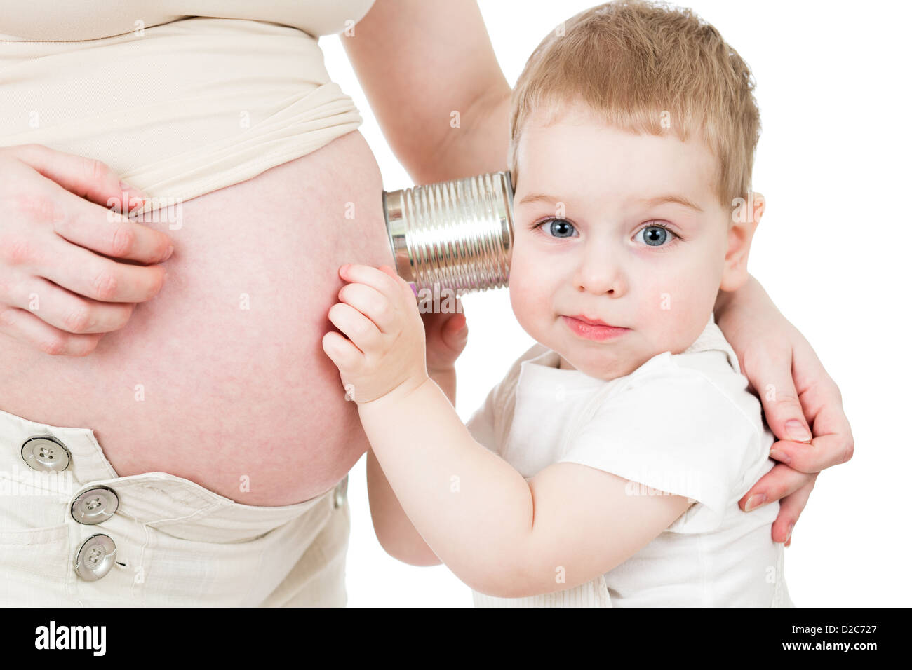Kleiner Junge mit zuhören können schwangere Mutter Bauch Stockfoto