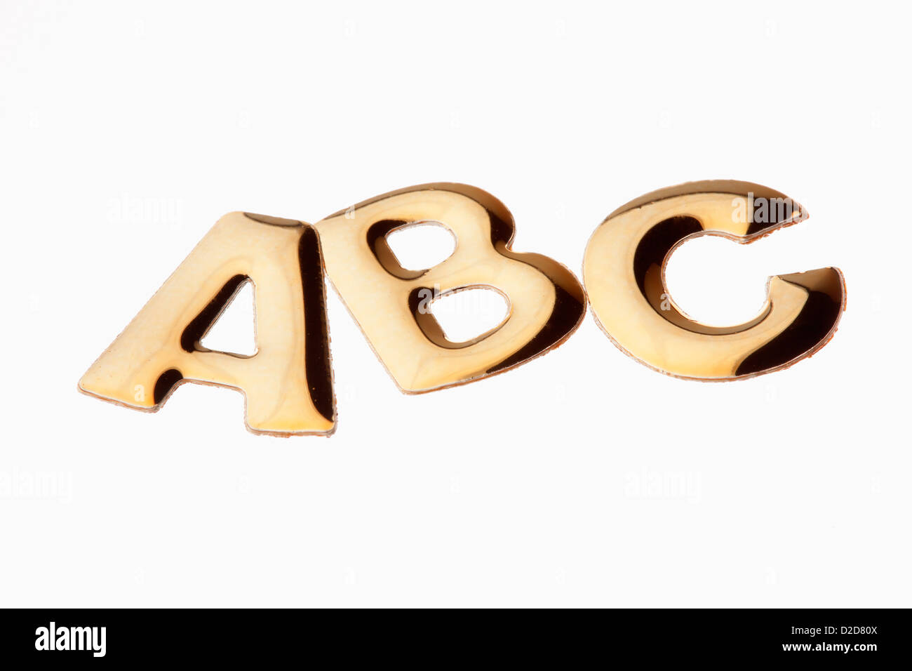 Die Buchstaben "ABC" in goldenem Schriftzug Stockfoto