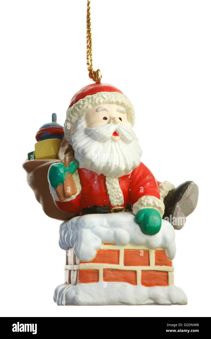 Santa Claus und Schornstein Weihnachtsdekoration auf weißem Hintergrund Stockfoto